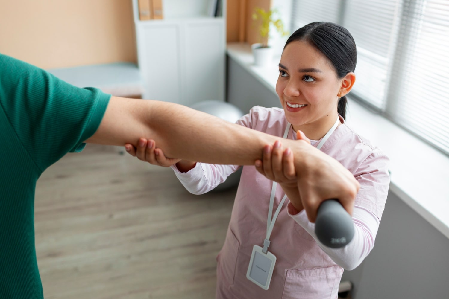 Physical therapist treating elbow pain in Scottsdale