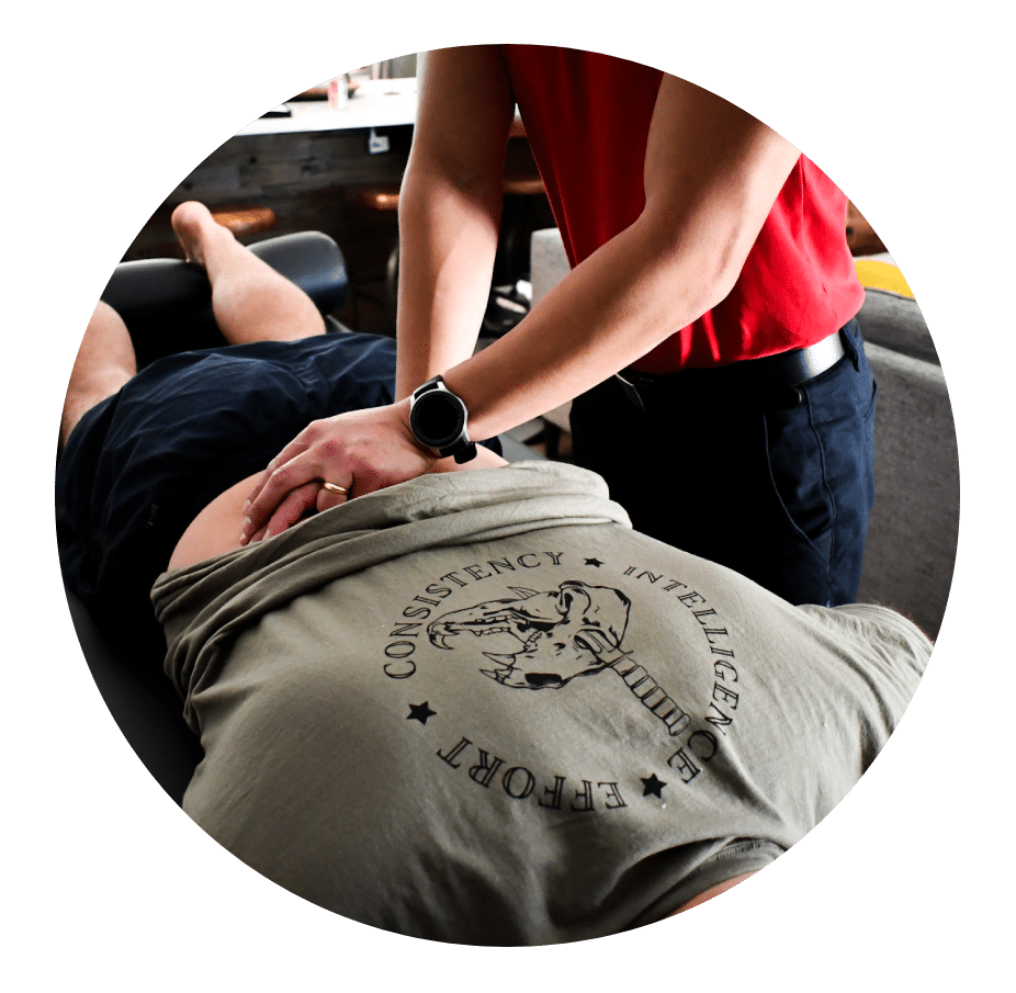 Hands-on spine treatment during a mobile physical therapy session