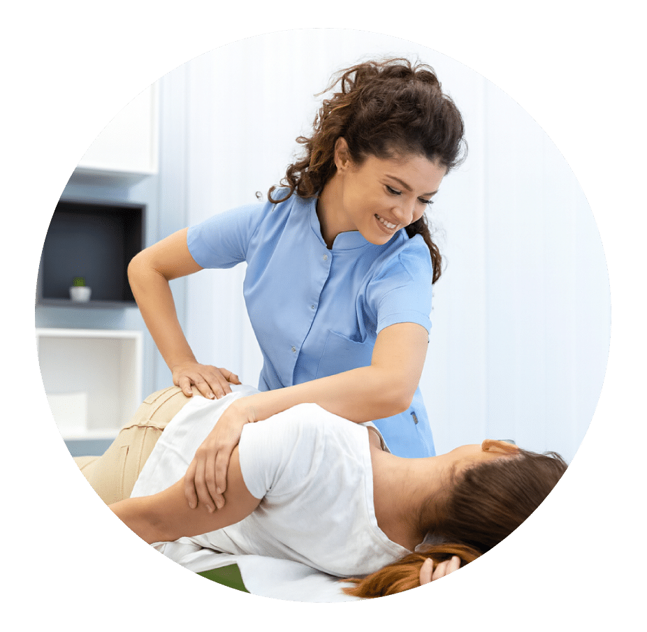 Physical therapist assessing a patient's SI joint and pelvis on a treatment table